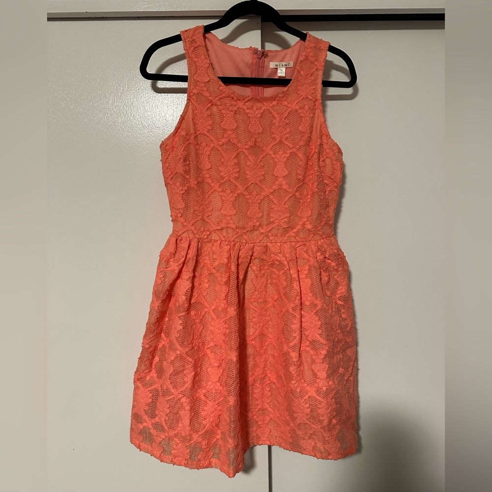 Francesca’s women’s dress in coral pink